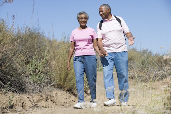senior couple on walk in countryside HY1gatnAHs