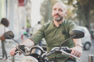 graphicstock handsome middle aged man motorcyclist in the city BTlWWzook  scaled